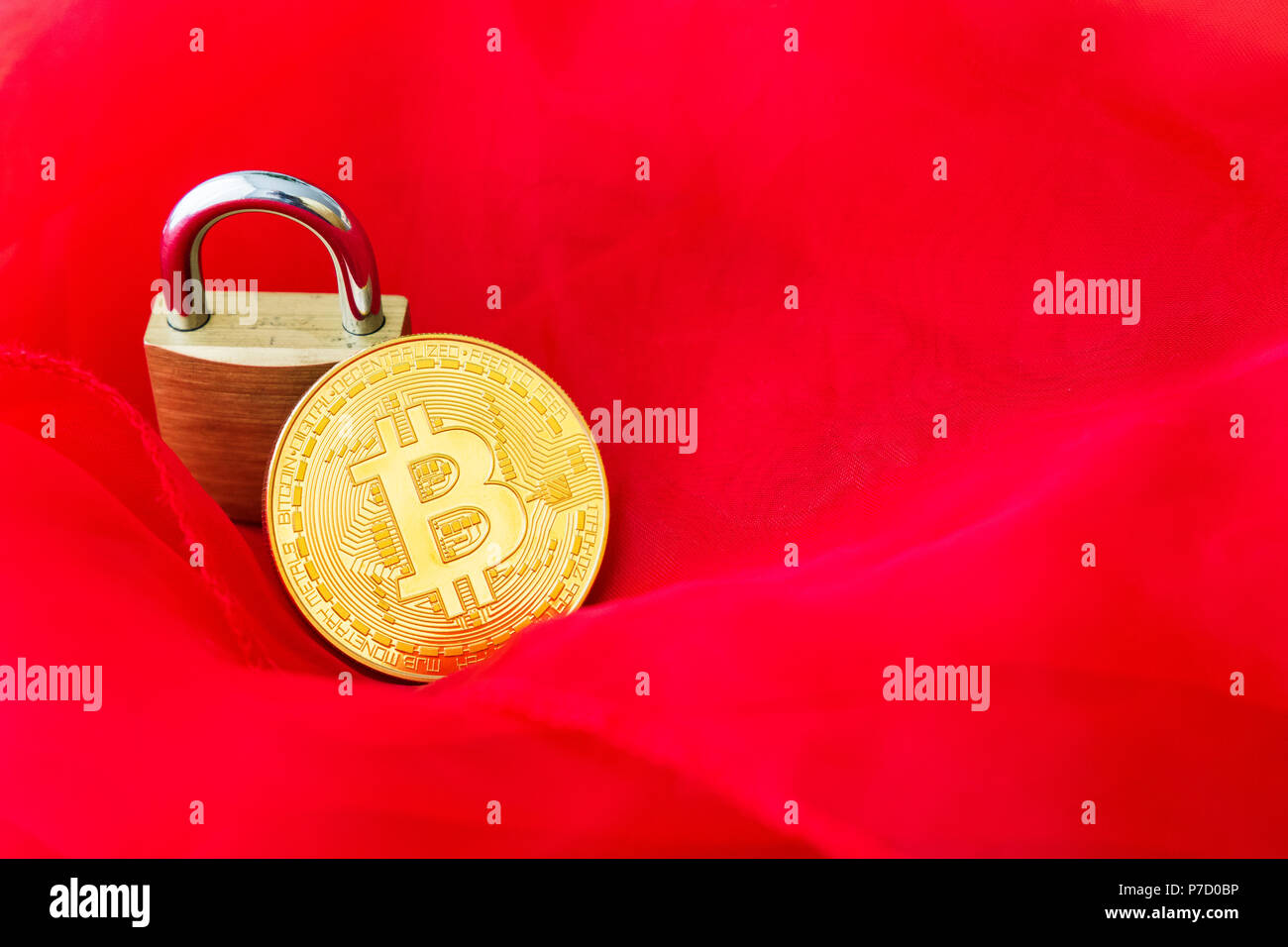 Un Bitcoin Cryptocurrency Bit digitale medaglia BTC valuta la tecnologia Internet Business concetto. Foto Stock