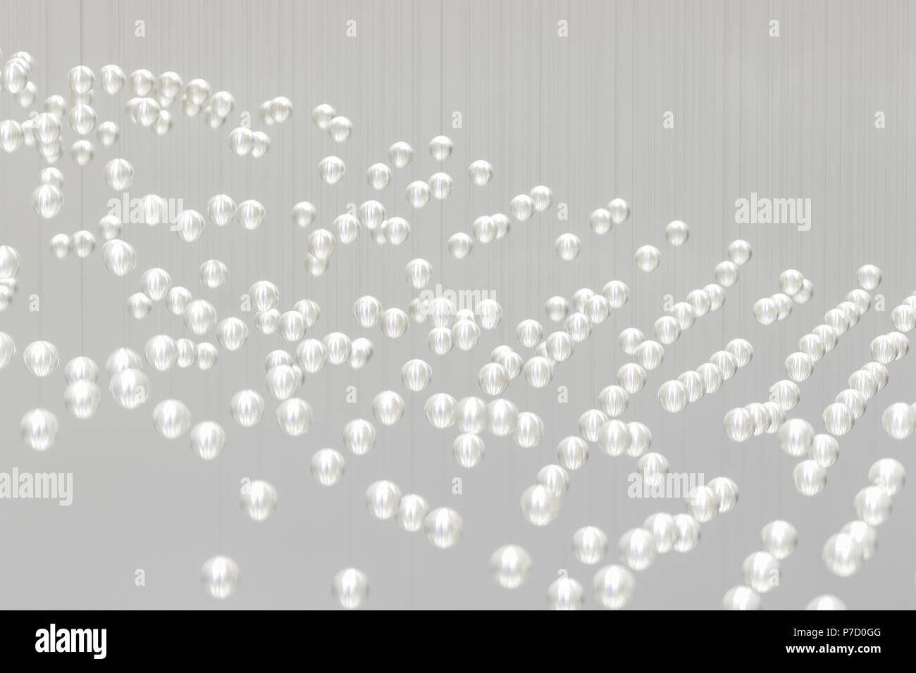 Gruppo di sfere di metallo sospeso in aria Foto Stock