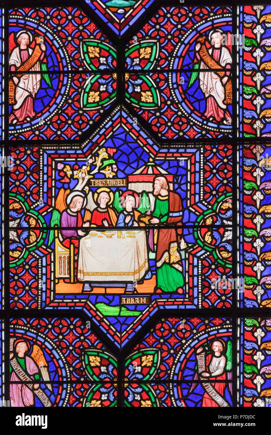 Un colorato di vetrate a Cattedrale di Lincoln, Inghilterra, illustrante, dal Vecchio Testamento, Abram (Abramo) riunione tre angeli. Foto Stock