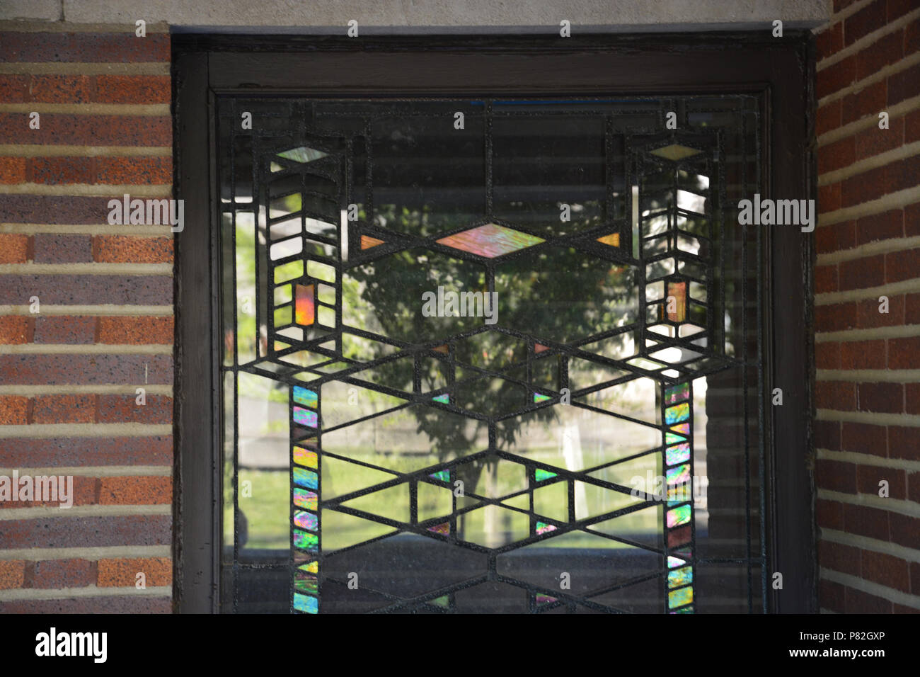 Dettaglio del vetro artistico leaded windows di Frank Lloyd Wright progettato Robie House a Chicago's Hyde Park quartiere. Foto Stock