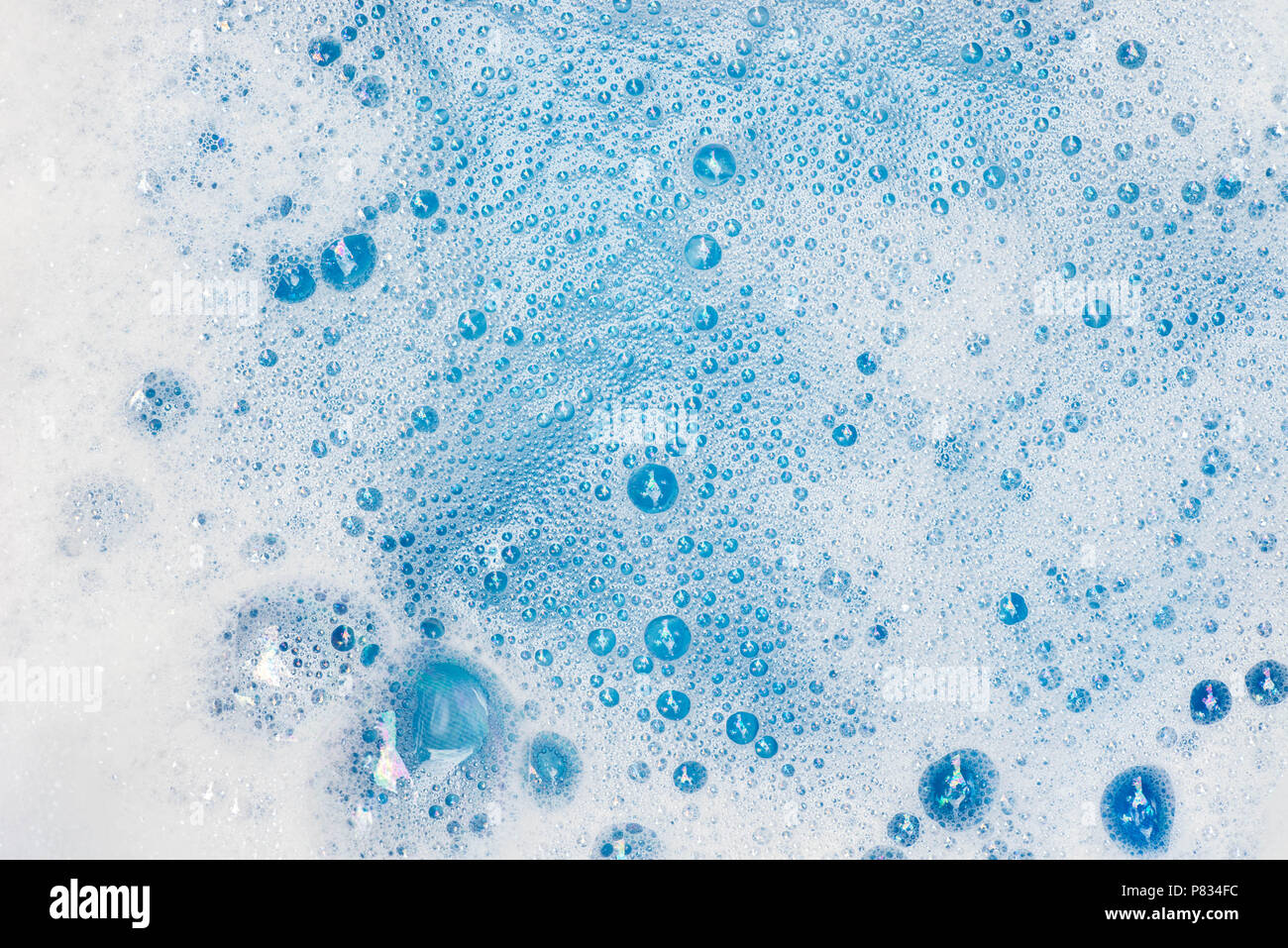 Schiuma di sapone con bolle macro texture di sfondo Foto stock - Alamy
