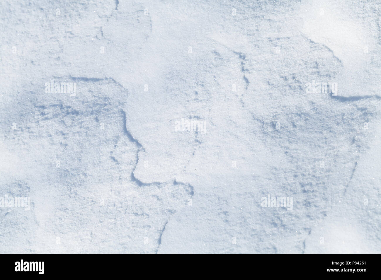 Abstract snow texture di sfondo, il cumulo di neve con belle ombre curvo Foto Stock