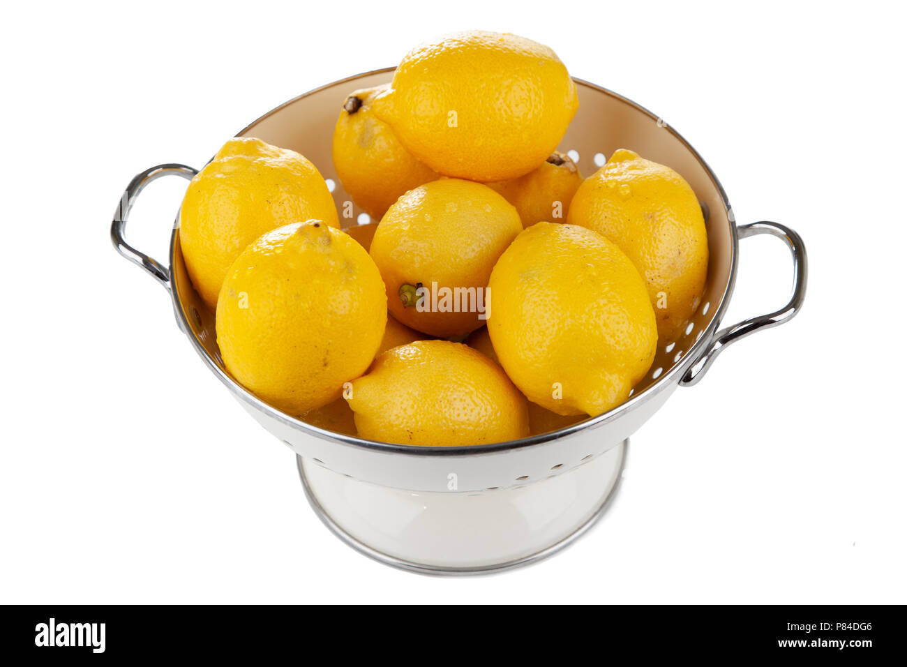 I limoni in uno scolapasta Foto Stock