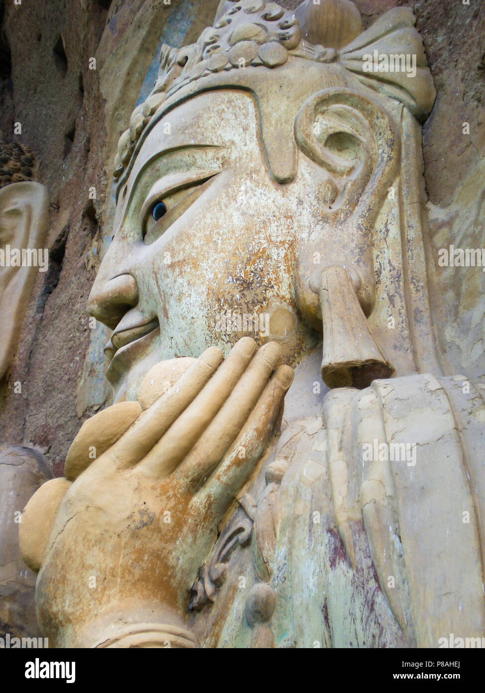 Bodhisattva in pietra statua presso le grotte di Maijishan nel Gansu, Cina. Foto Stock