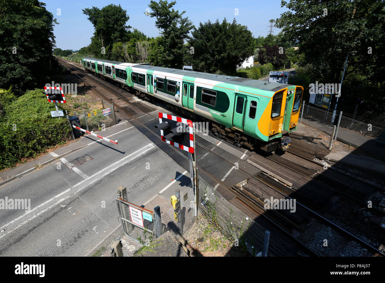 Bosham Stazione ferroviaria incrocio ferroviario, West Sussex, Regno Unito. Foto Stock