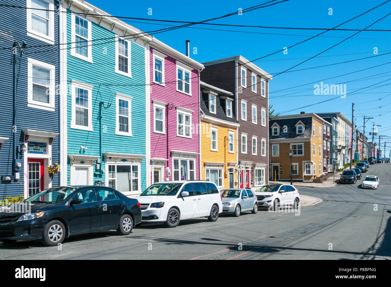 Jellybean Riga o case colorate su Gower Street a St John, Terranova Foto Stock