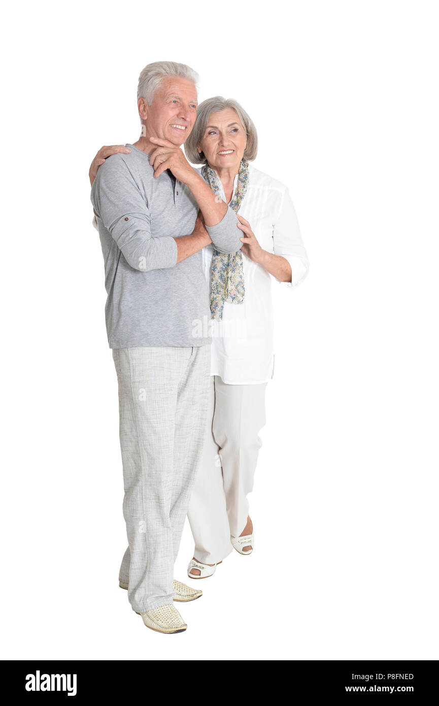 Ritratto di coppia senior abbracciando isolato Foto Stock