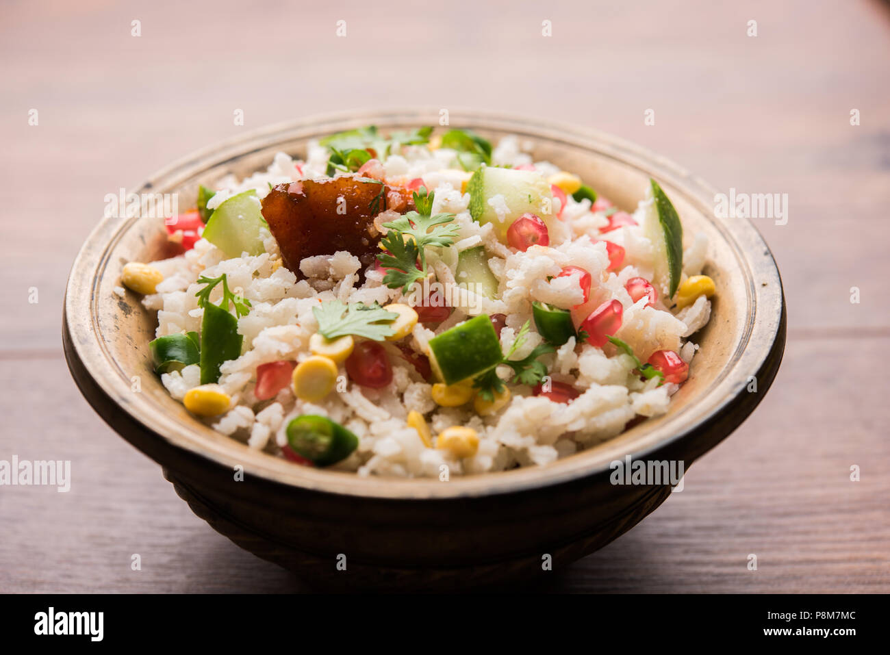 GopalKala o Dahi Kala è un prasad offerto al Signore Krishna su Janmashtami Gokulashtami o. Realizzati utilizzando riso battuto, cagliata/latte, zucchero, melograno Foto Stock