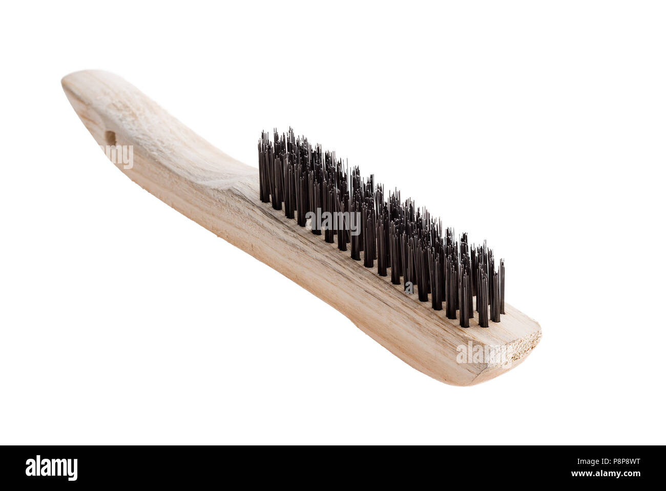 Vista ravvicinata del legno e la spazzola di pulizia contro uno sfondo bianco Foto Stock