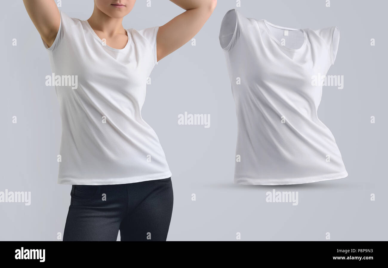 Mockup impostato con fit modello femminile nel fustellato t-shirt e forma di t-shirt senza corpo isolato sullo sfondo per studio, vista frontale. Modello per Foto Stock