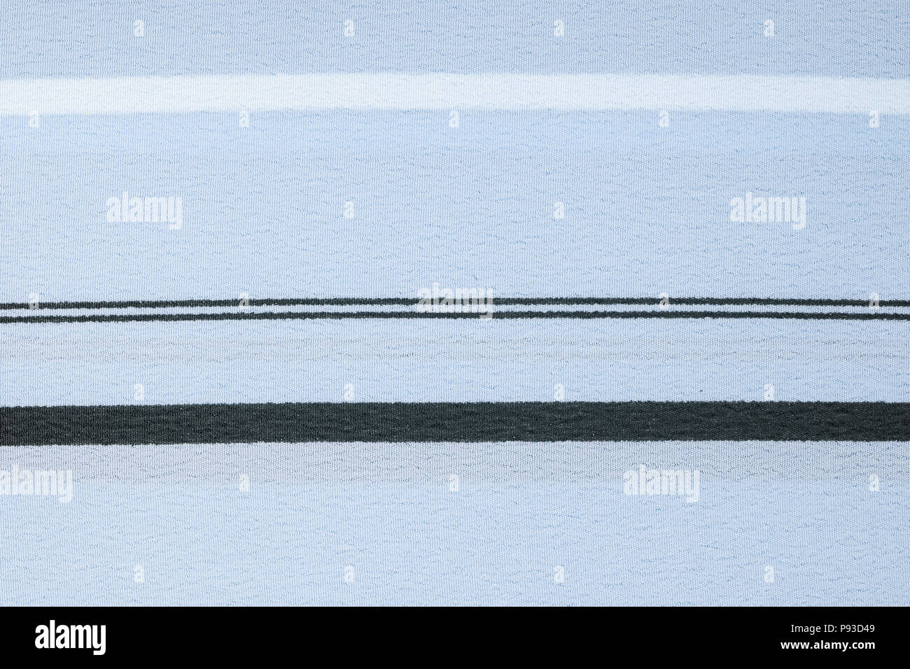 Tessuto blu texture con le strisce bianche e nere pattern. Primo piano Foto Stock