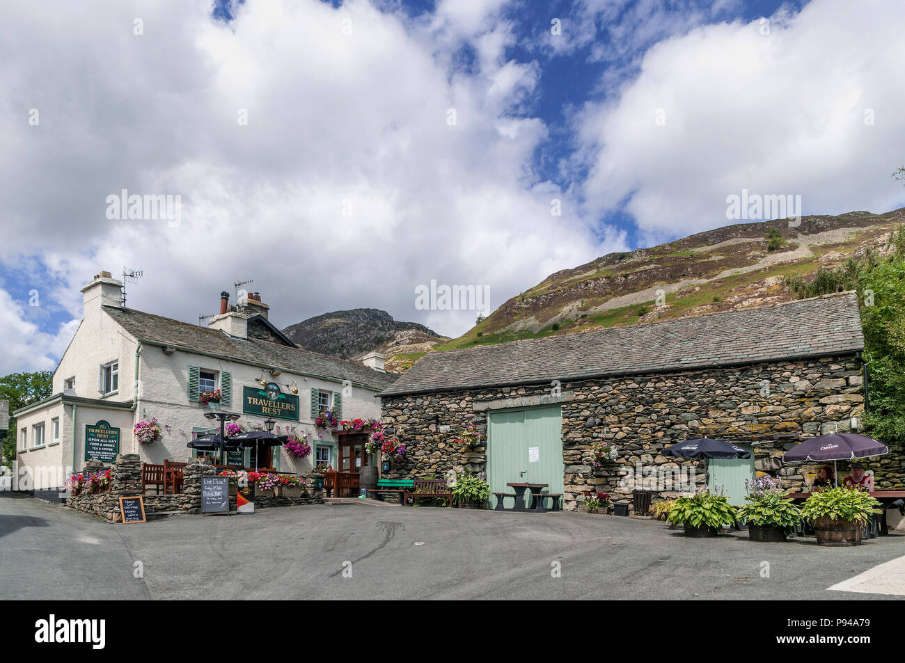 Lake District. Glenridding. I viaggiatori resto pub. Foto Stock
