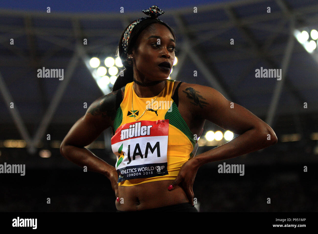 Elaine Thompson della Giamaica dopo la finitura secondo in donne 100m. Atletica World Cup 2018 , il giorno 1 presso il London Stadium di Queen Elizabeth Olympic Park, Stratford sabato 14 luglio 2018. L'evento inaugurale dispone di otto nazioni; USA, GB & NI, Polonia, Cina, Germania, Francia, Giamaica e Sud Africa. Questa immagine può essere utilizzata solo per scopi editoriali. Solo uso editoriale, pic da Steffan Bowen/Andrew Orchard fotografia sportiva/Alamy Live news Foto Stock