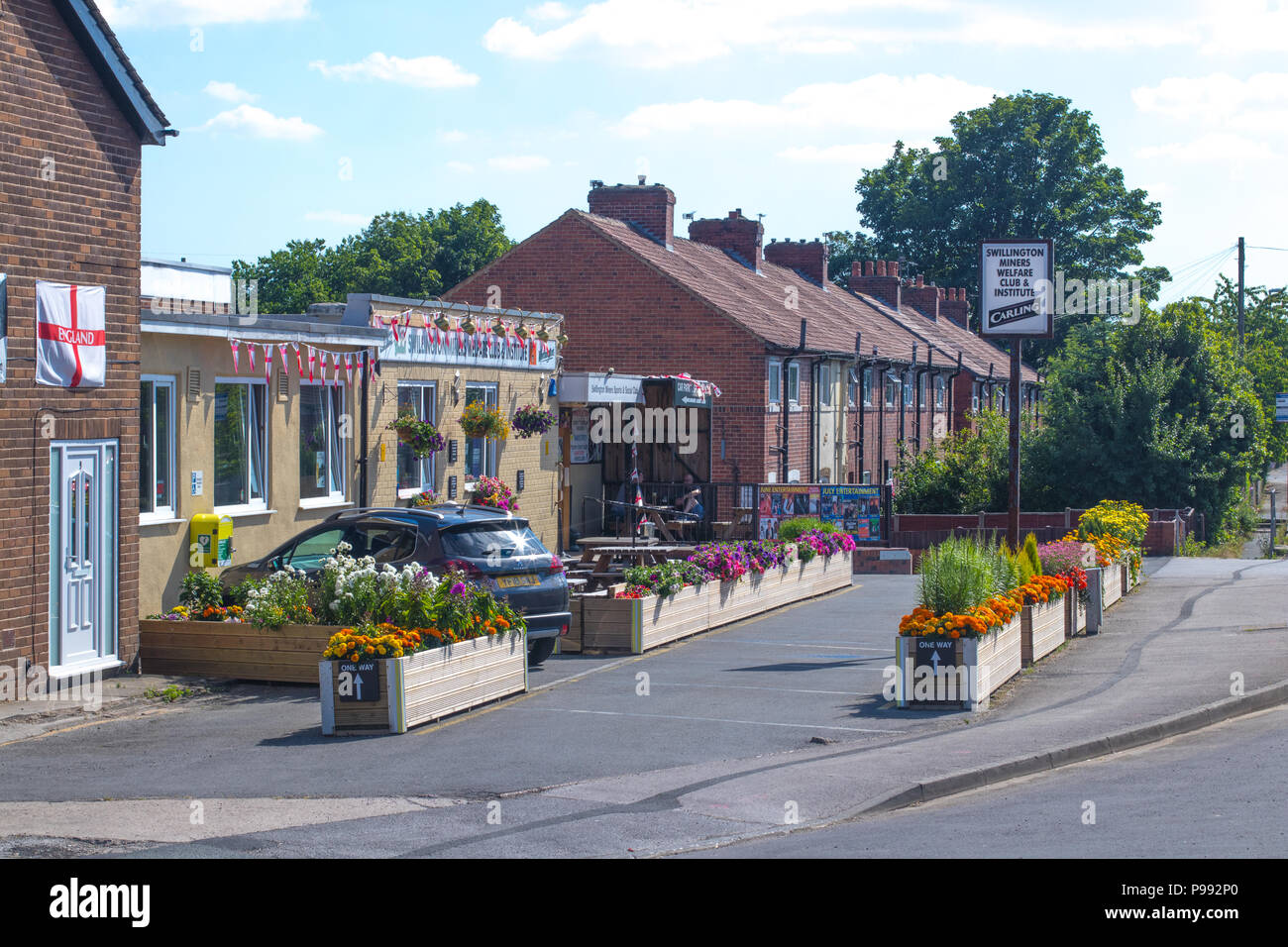 Il splendidamente decorate esterno di Swillington minatori Welfare Club a Leeds Foto Stock