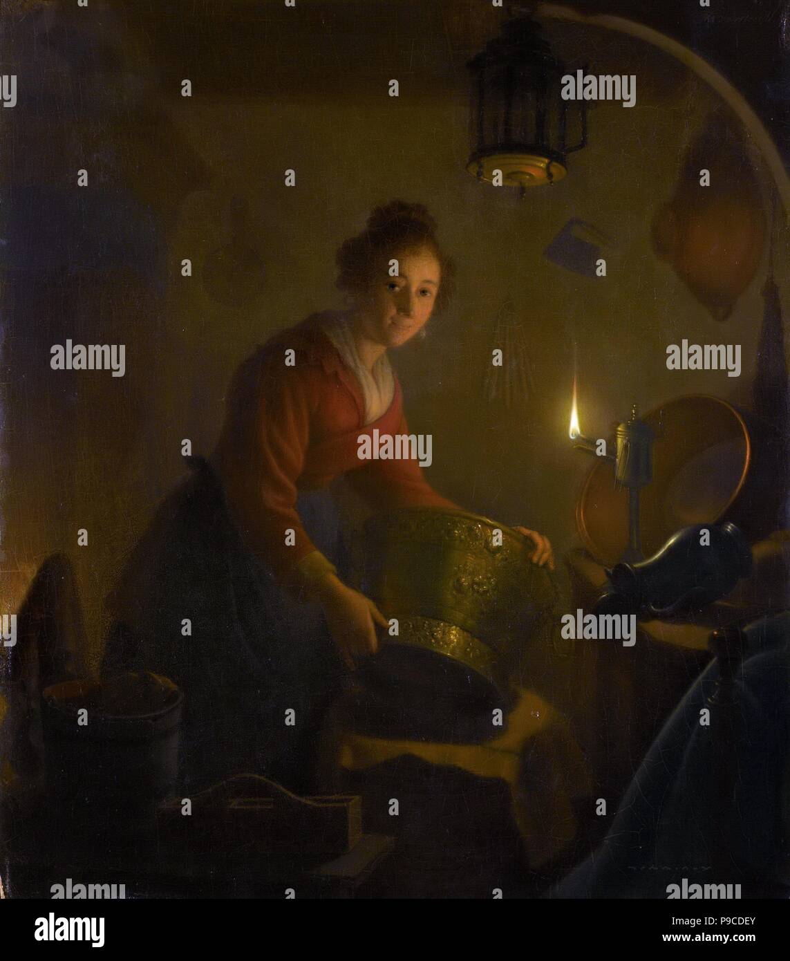 La donna in una cucina a lume di candela. Museo: Rijksmuseum Amsterdam. Foto Stock