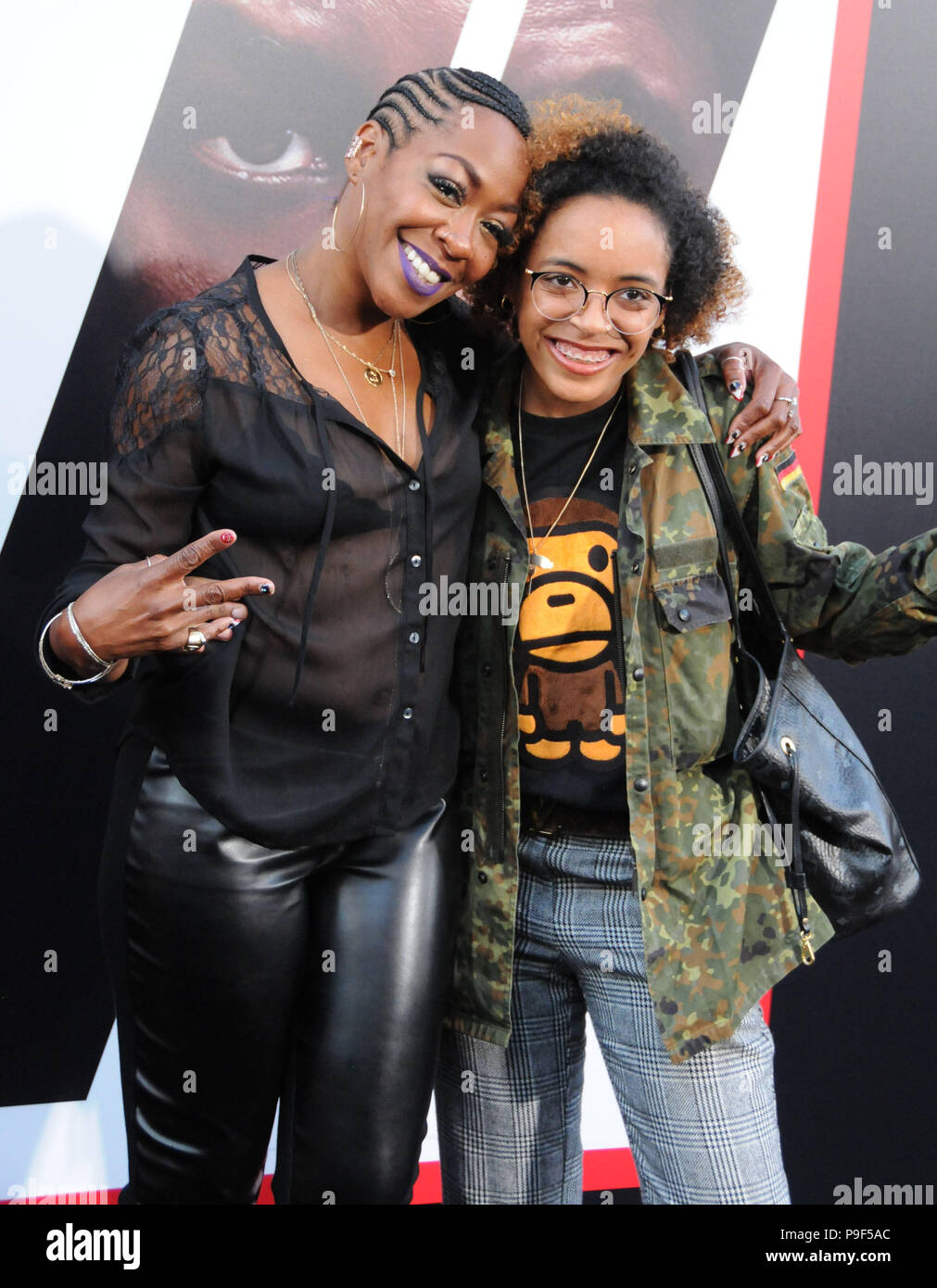 Los Angeles, California, USA. 17 Luglio, 2018. L'attrice Tichina Arnold e figlia Alijah Kai Haggins frequentare la Columbia Picture la prima mondiale di "Equalizzatore 2' a TCL Chinese Theatre sulla luglio 17, 2018 a Hollywood, in California. Foto di Barry re/Alamy Live News Foto Stock