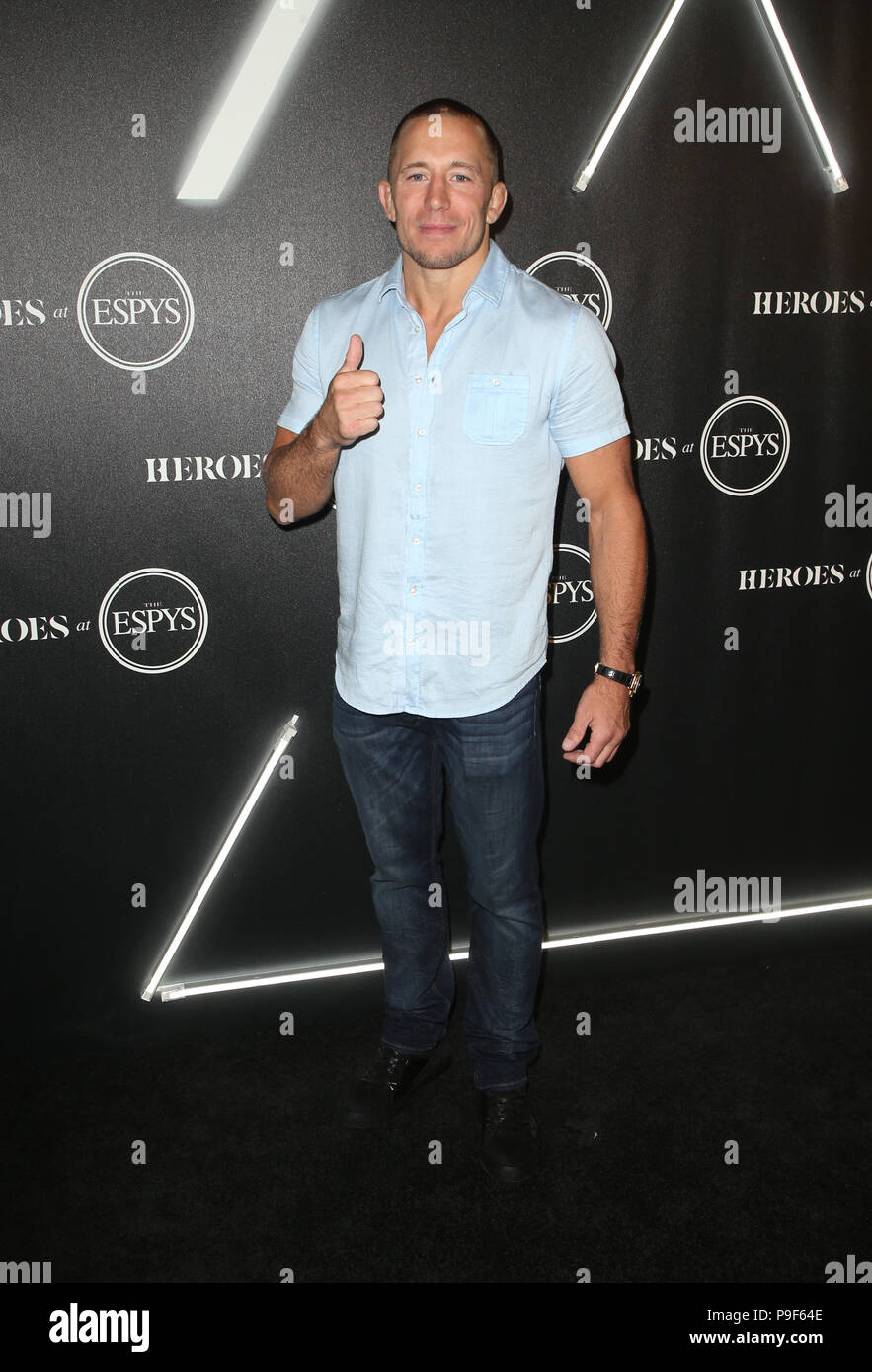 Los Angeles, Ca, Stati Uniti d'America. 17 Luglio, 2018. Georges St-Pierre, a ESPN HEROES AL ESPYS Pre-Party ufficiale al Mercato della Città casa sociale a Los Angeles, la California il 17 luglio 2018. Credito: Faye Sadou/media/punzone Alamy Live News Foto Stock