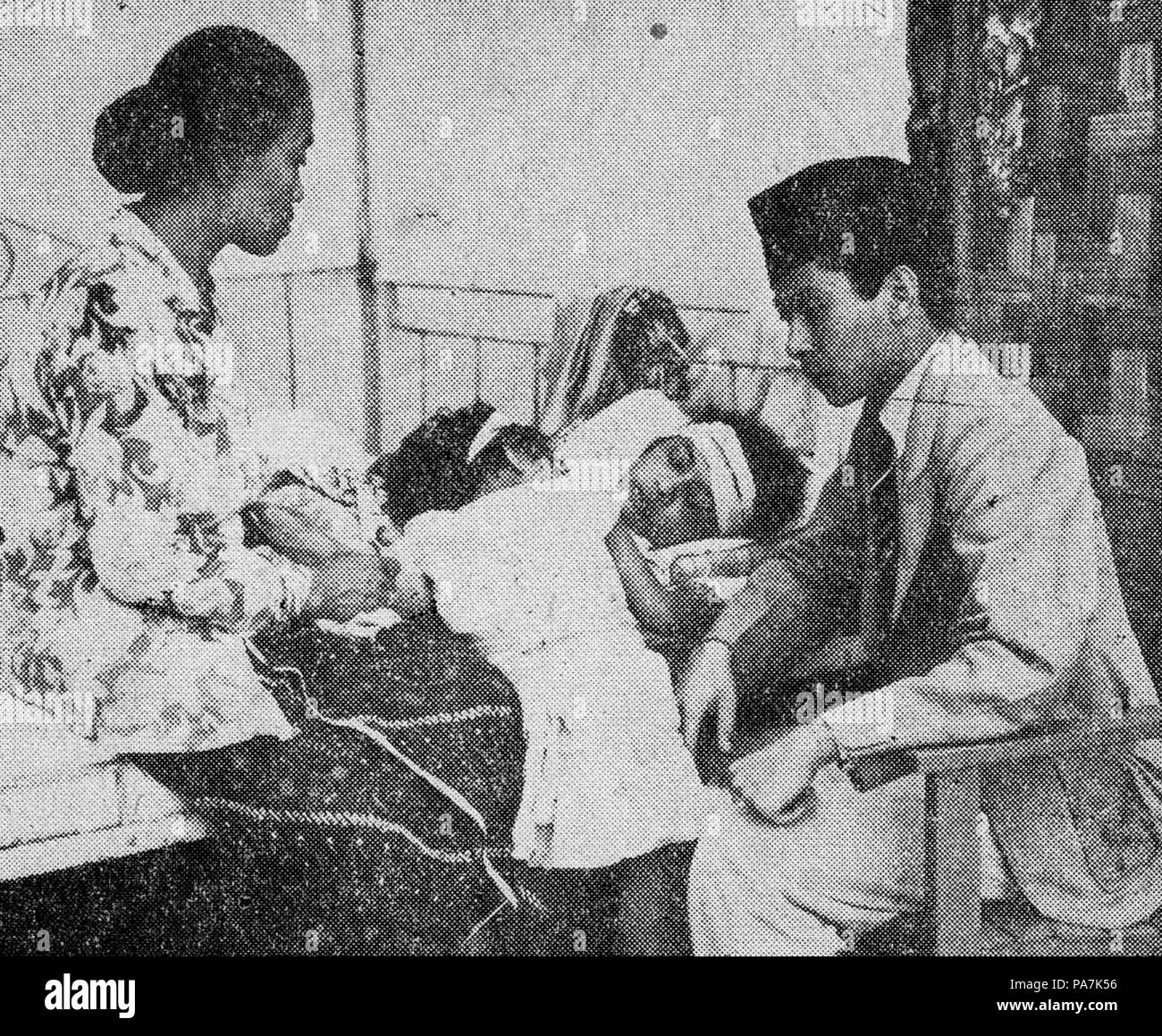 60 Dasima ammalato a casa di Winata, Dasima (1940), p40 Foto Stock