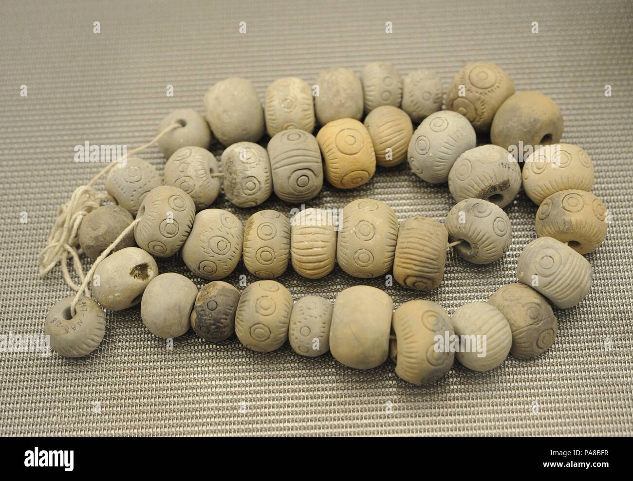 Perline in terracotta. Museo dell'Acropoli. Atene. La Grecia. Foto Stock