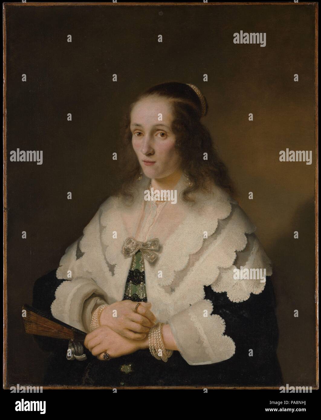 Ritratto di una donna. Artista: Ferdinand Bol (Olandese, Dordrecht 1616-1680 Amsterdam). Dimensioni: 34 3/8 x 28 in. (87,3 x 71,1 cm). Data: 1642. Questo è uno dei tre ritratti di donne da Bol inscritto 1642, prima data nota sui dipinti da lui. Il Dordrecht artista studiato con Rembrandt circa 1636-41, e poi divenne uno di Amsterdam di maggior successo portraitists. Nonostante il display ricco di pizzi e gioielli in questa immagine la sua più interessante aspetto è il sitter del senso di carattere, come in Rembrandt ritratti di circa lo stesso tempo. Museo: Metropolitan Museum of Art di New York, Stati Uniti d'America. Foto Stock