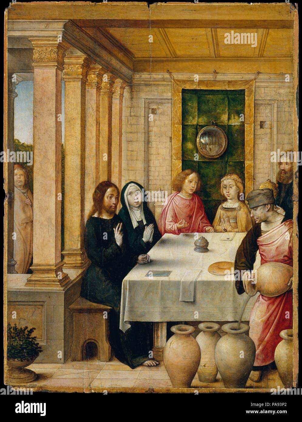 La festa di nozze di Cana. Artista: Juan de Flandes (Netherlandish, attivo dal 1496-morto 1519 Palencia). Dimensioni: 8 1/4 x 6 1/4 in. (21 x 15,9 cm). Data: ca. 1500-1504. Questo è stato uno dei quaranta-sette pannelli raffiguranti la vita di Cristo e la Vergine che sono state fatte per Isabella di Castiglia. L'immagine dell'oggetto è la festa di nozze di Cana, quando Cristo ha effettuato il suo primo miracolo trasformando l acqua in vino. Lo specchio convesso, visto dietro la coppia sposata, è un motivo comune nella pittura Netherlandish. La fase preparatoria underdrawing rivela un numero di dettagli aneddotica che non sono mai state verniciate. Foto Stock