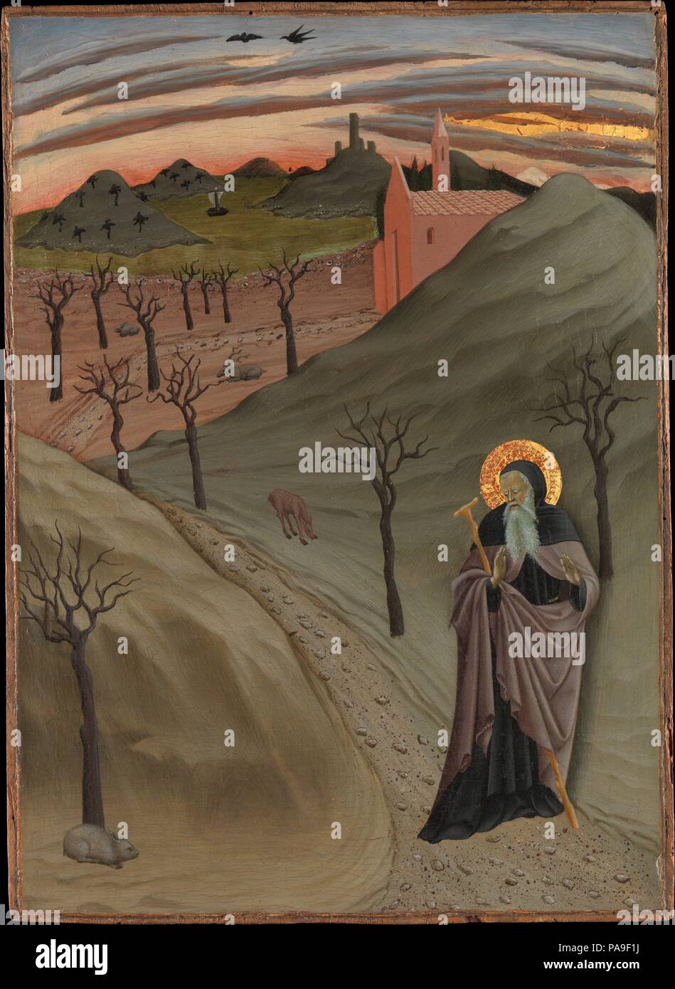 San Antonio abate nel deserto. Artista: Osservanza Master (italiano, Siena, attivo secondo quarto del XV secolo). Dimensioni: complessivamente 18 3/4 x 13 5/8 in. (47,6 x 34,6 cm); superficie dipinta 18 1/2 x 13 1/4 in. (47 x 33,7 cm). Data: ca. 1435. Questo pannello è parte di un ciclo di scene raffiguranti la vita del santo eremita Antonio Abate. Il pittore della propensione per originale e descrittivi dettaglio narrativo appare nel trattamento del paesaggio del deserto e la sua fauna (simboli del santo tentazioni) sotto il cielo luminoso al crepuscolo. Una pentola d'oro nell'angolo inferiore sinistro (che ha bee Foto Stock