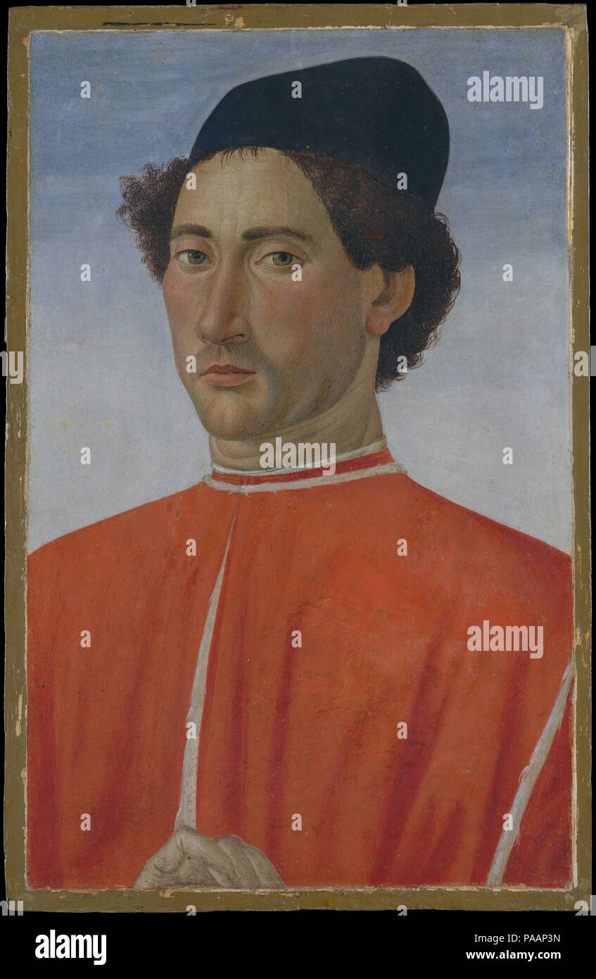 Ritratto di un uomo. Artista: Cosimo Rosselli (Italiano, 1440-1507 Firenze Firenze). Dimensioni: 20 3/8 x 13 in. (51,8 x 33 cm). Data: ca. 1481-82. Se questo ritratto fu dipinto a Roma, dove Cosimo Rosselli è stato impiegato nella Cappella Sistina, o a Firenze, non può essere detto con certezza. Il sitter indossa un costoso doppietto rosso foderato di ermellino e pone la sua mano sul bordo del telaio, in una maniera che risulti in Netherlandish ritratti di Hans Memling. Netherlandish ritratti furono molto apprezzati per la loro veridicità descrittivo. Museo: Metropolitan Museum of Art di New York, Stati Uniti d'America. Foto Stock