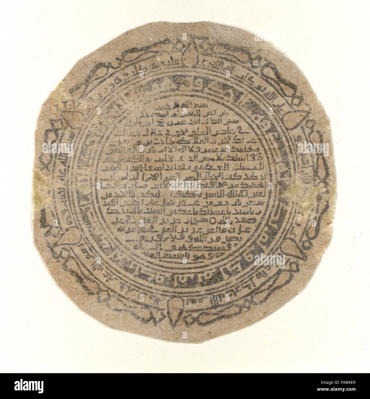 Blocco-stampato circolare Talismanic foglia. Dimensioni: 3 x 2 3/4 in. (7,6 x 7 cm). Data: XI secolo. Museo: Metropolitan Museum of Art di New York, Stati Uniti d'America. Foto Stock