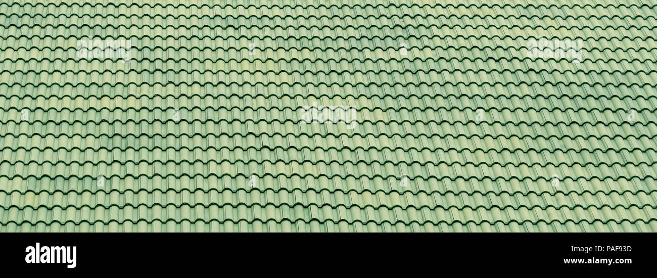 Modello di tetto verde piastrelle, fondo di architettura. Foto Stock