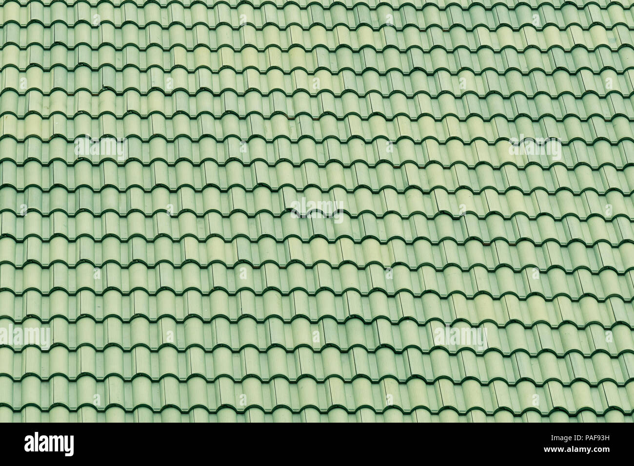 Modello di tetto verde piastrelle, fondo di architettura. Foto Stock