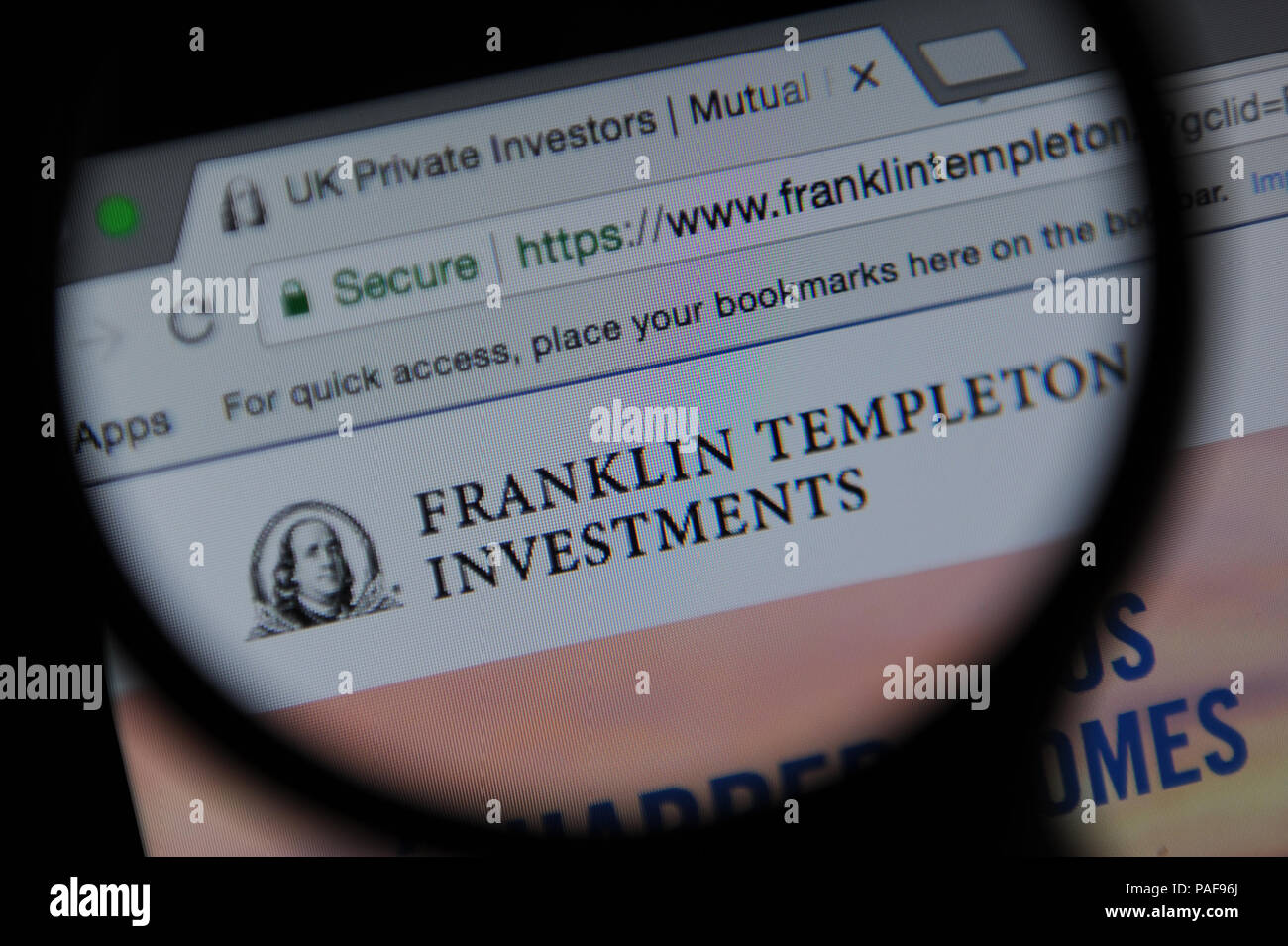 Il Franklin Templeton investimenti sito visto attraverso una lente di ingrandimento Foto Stock