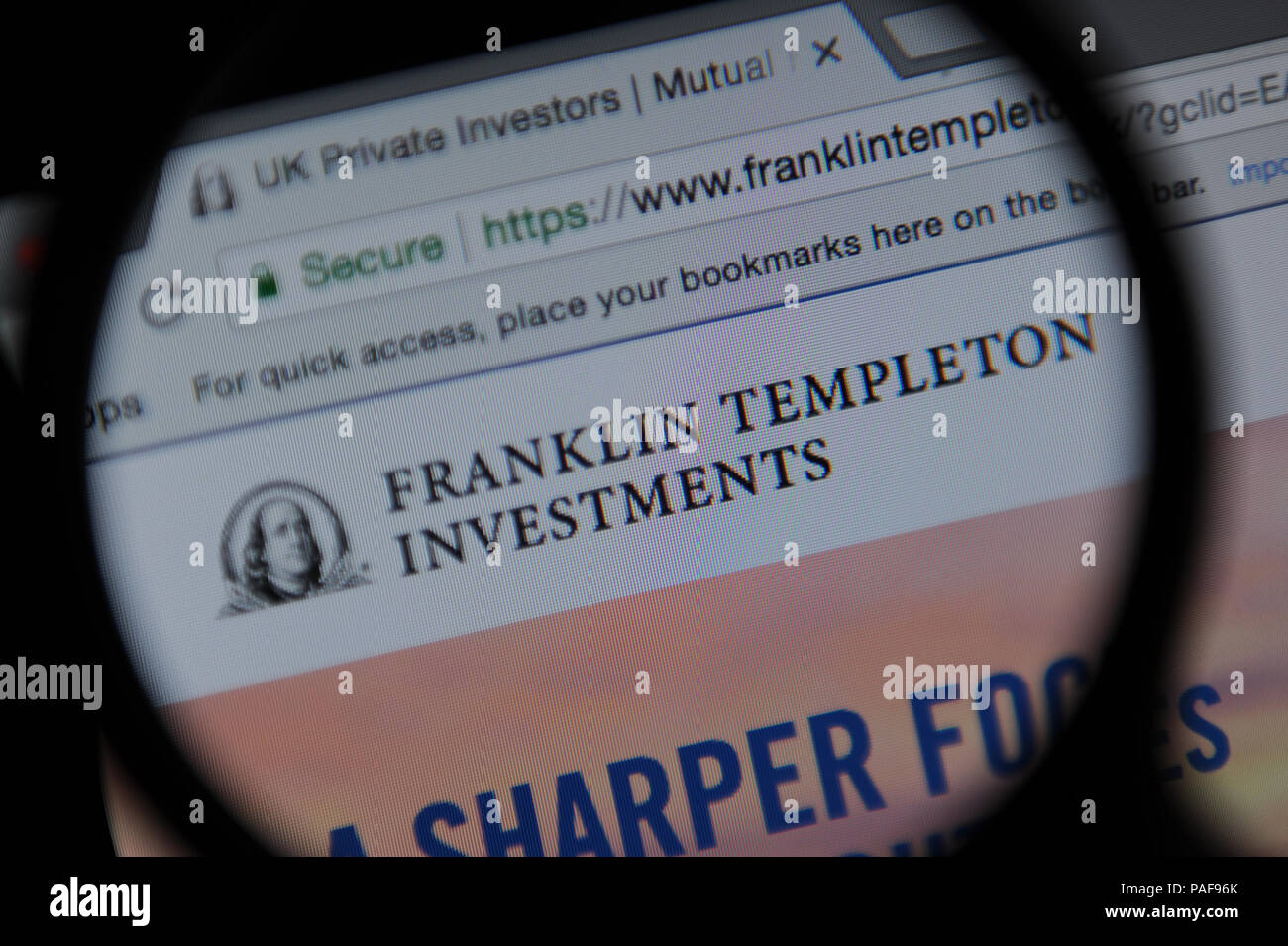 Il Franklin Templeton investimenti sito visto attraverso una lente di ingrandimento Foto Stock