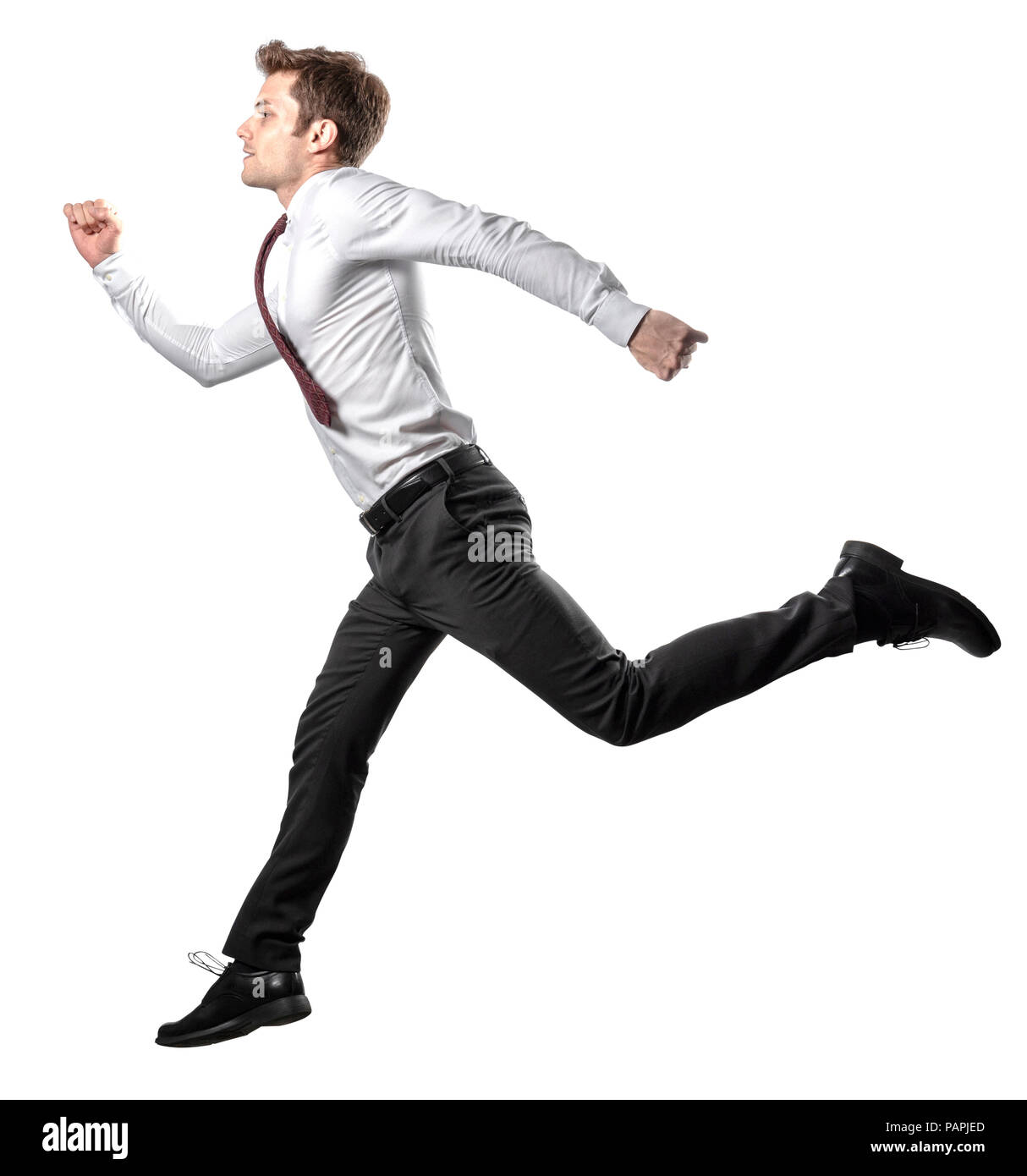 Jumping imprenditore isolato su bianco Foto Stock