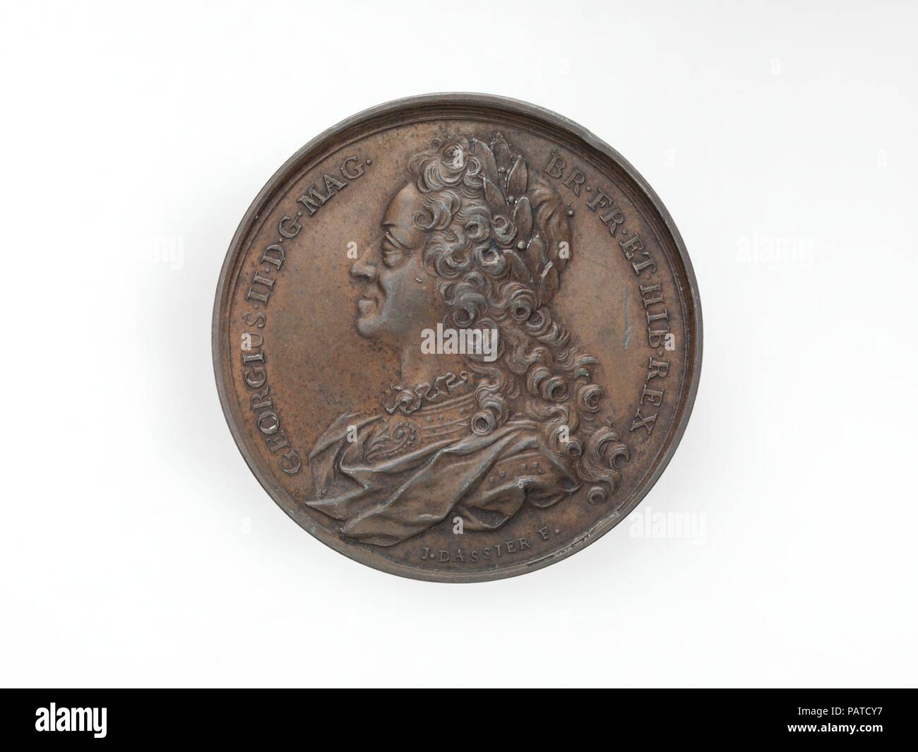 George II. Artista: medaglia: Jean Dassier (1676-1763 Ginevra Ginevra). Cultura: British. Dimensioni: diametro (conferma): 4,1 cm (41 mm). Data: 1731-32. Questa medaglia di George II appartiene alla monarchi Inglesi serie dalla Swiss medaglia Jean Dassier (1676-1763). Dassier era il capo incisore della zecca di Ginevra e il gruppo a cui questa medaglia appartiene (2014.457.1-10) sono tra i suoi più importanti lavori medallic, parte di una serie di 33 medaglie dei sovrani inglesi iniziato durante il suo secondo soggiorno a Londra e approvato dalla Regina Carolina. Queste medaglie rappresentano un importante Medaglia Europea ho Foto Stock