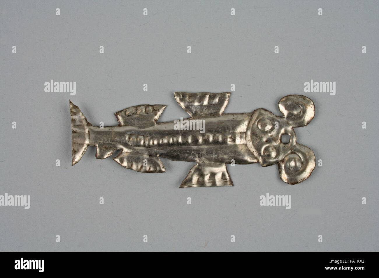 Ornamento tessile. Cultura: Chimú (?). Dimensioni: D. 1 1/4 in. (3.2 cm). Data: XIV-XV secolo. Museo: Metropolitan Museum of Art di New York, Stati Uniti d'America. Foto Stock