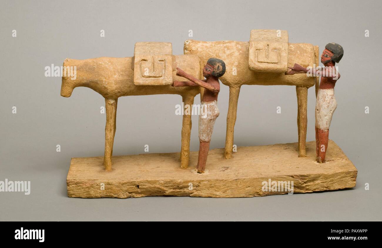 Il modello di due asini con i driver. Dimensioni: h. 17,5 cm (6 7/8 in); l. 50,5 cm (19 7/8 in.). Dynasty: Dynasty 11-metà 12. Data: ca. 2030-1850 A.C. Museo: Metropolitan Museum of Art di New York, Stati Uniti d'America. Foto Stock