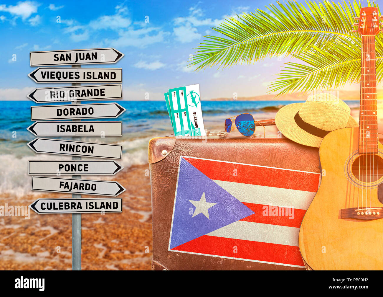 Concetto di estate viaggia con la vecchia valigia e Puerto Rico città segno Foto Stock