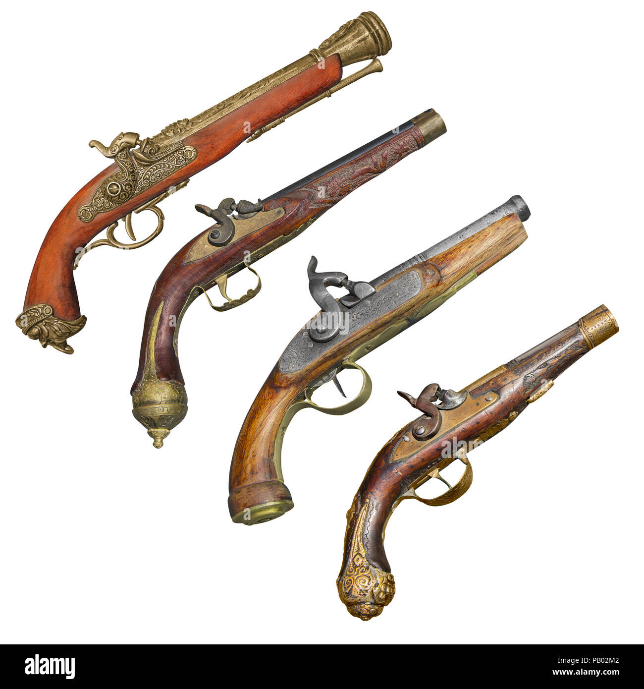 Quattro vecchi vintage pistola firelock isolati su sfondo bianco Foto Stock