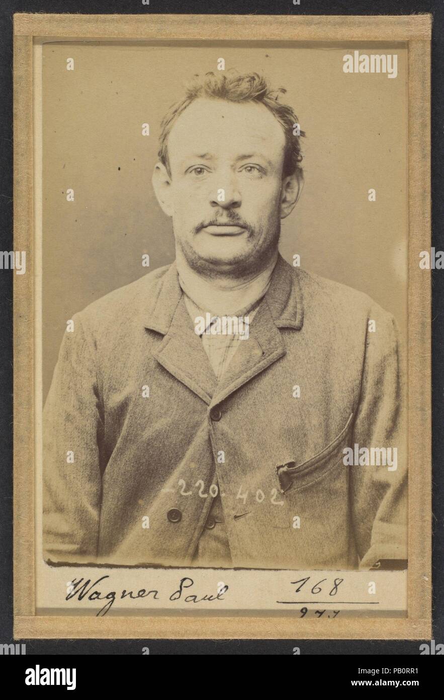 Wagner. Paolo, Louis. 38 ans, né le 14/10/55. Ébéniste. Anarchiste. 2/7/94. Artista: Alphonse Bertillon (Francese, 1853-1914). Dimensioni: 10,5 x 7 x 0,5 cm (4 1/8 x 2 3/4 x 3/16 in.). Data: 1894. Nato in una famiglia di illustri scienziati e studiosi di statistica, Bertillon ha iniziato la sua carriera come un impiegato dell'Ufficio di identificazione della Parigi Prefettura di Polizia nel 1879. Con il compito di mantenere affidabile di polizia record dei trasgressori, ha sviluppato il primo sistema moderno di identificazione criminale. Il sistema, che divenne noto come Bertillonage, aveva tre componenti: misurazioni antropometriche, Foto Stock