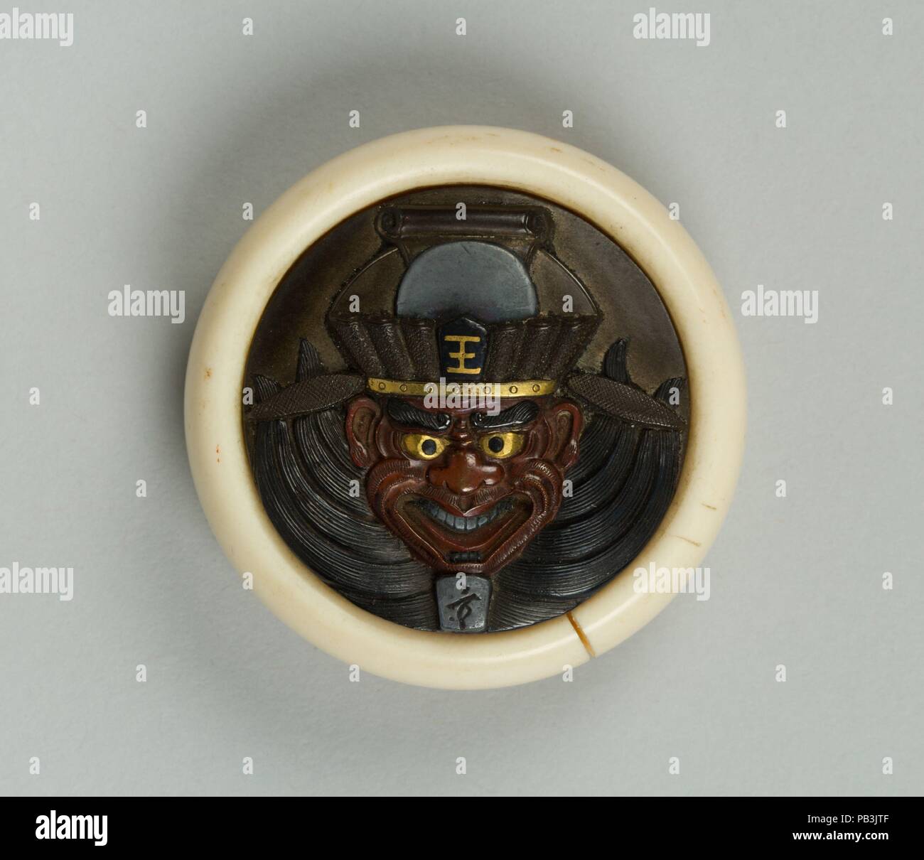 Netsuke con la testa di un cinese salvia. Cultura: il Giappone. Dimensioni: diam. 1 3/4 in. (4.4 cm); D. 5/8 in. (1.6 cm). Data: del XIX secolo. Museo: Metropolitan Museum of Art di New York, Stati Uniti d'America. Foto Stock