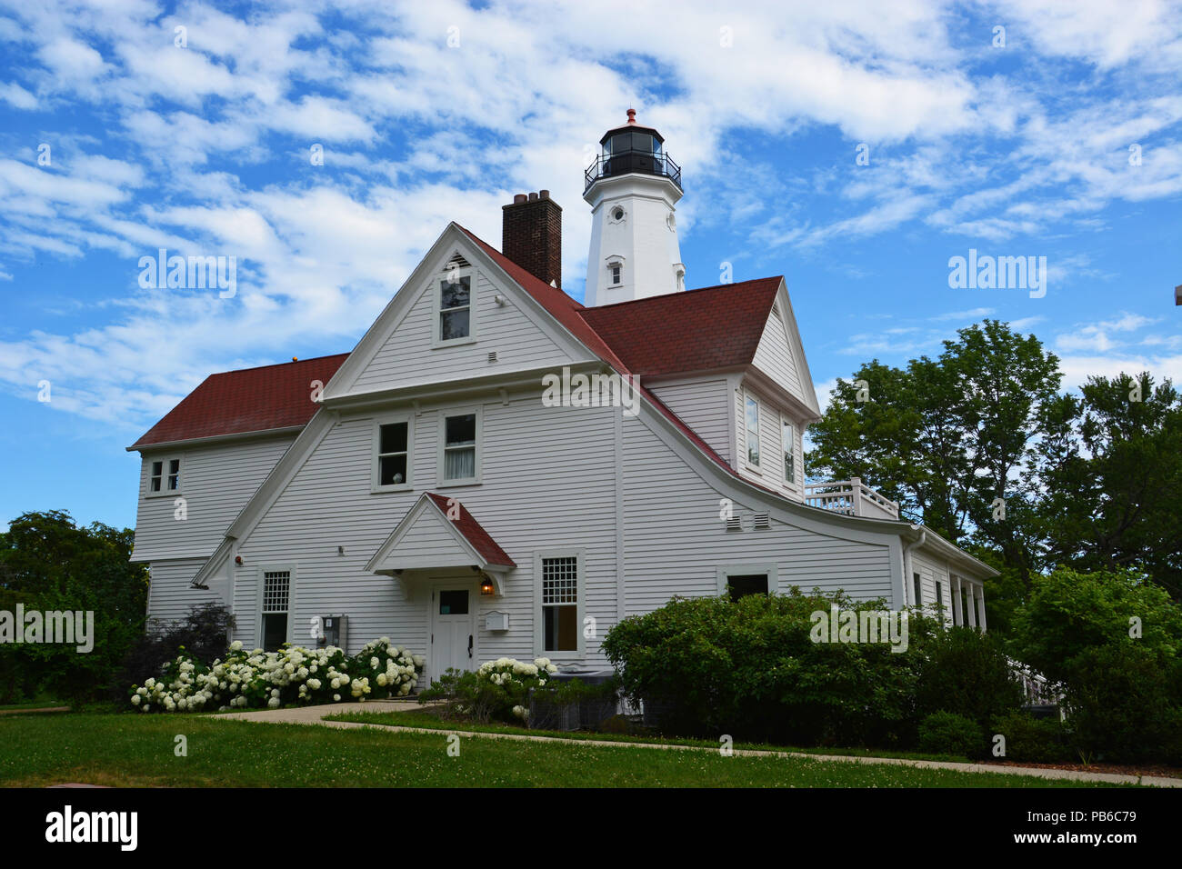 Il 1887 tower e custodi house presso il punto nord Stazione di luce a nord del centro di Milwaukee. Foto Stock