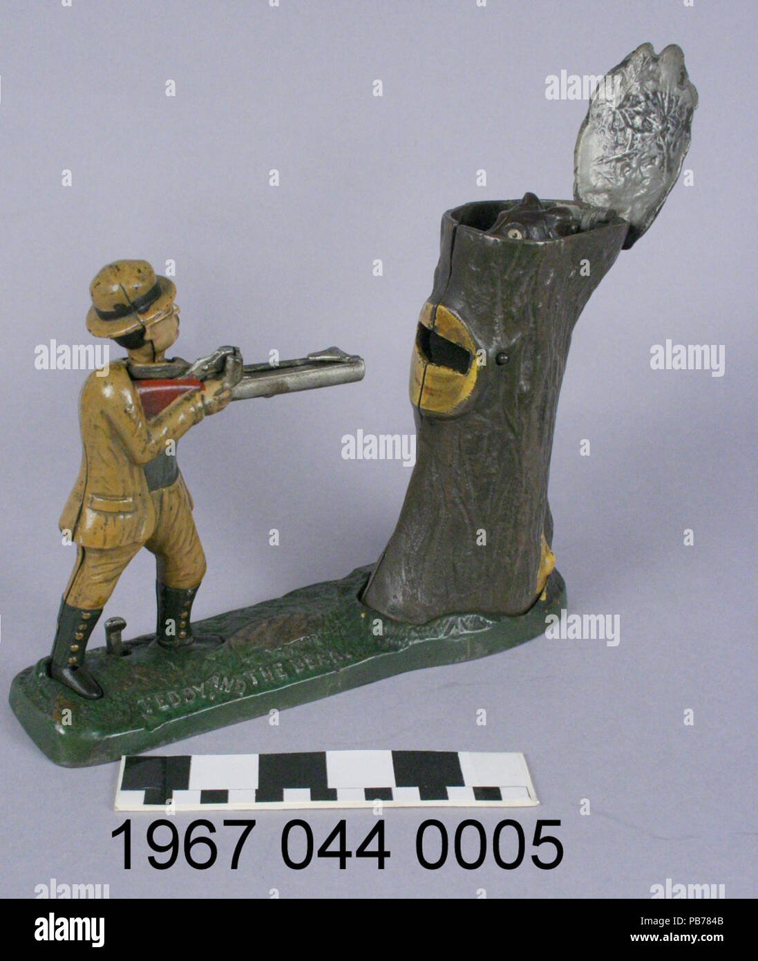 1601 Teddy e l'Orso meccanica Banca di monete Foto Stock