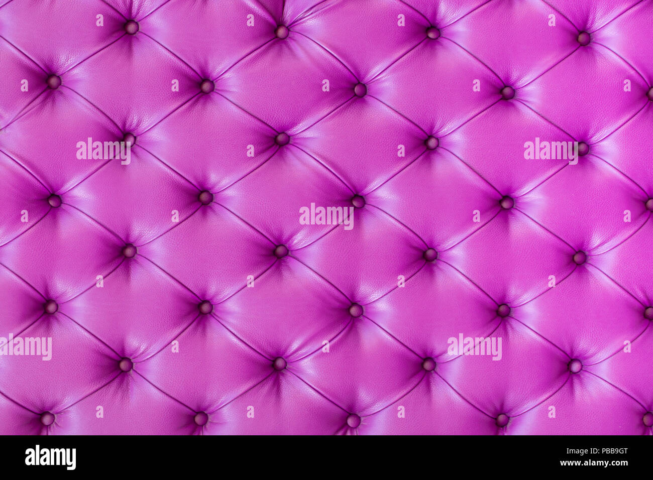 Background e texture lilla trapuntato divano Foto Stock