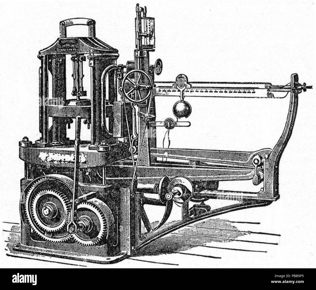 . Inglese: Disegno di una macchina da test per analizzare la resistenza dei materiali. pubblicato 1914 1121 NSRW Testing-Machine Foto Stock