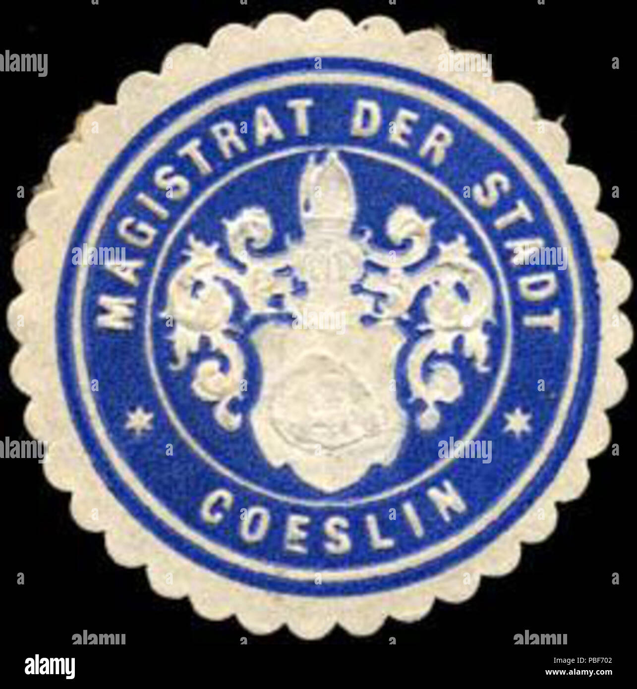 Alte Briefverschlussmarke aus Papier, welche seit ca. 1850 von Behoerden, Anwaelten, Notaren und Firmen zum verschliessen der Post verwendet wurde. 1479 Siegelmarke Magistrat der Stadt - Köslin W0204420 Foto Stock