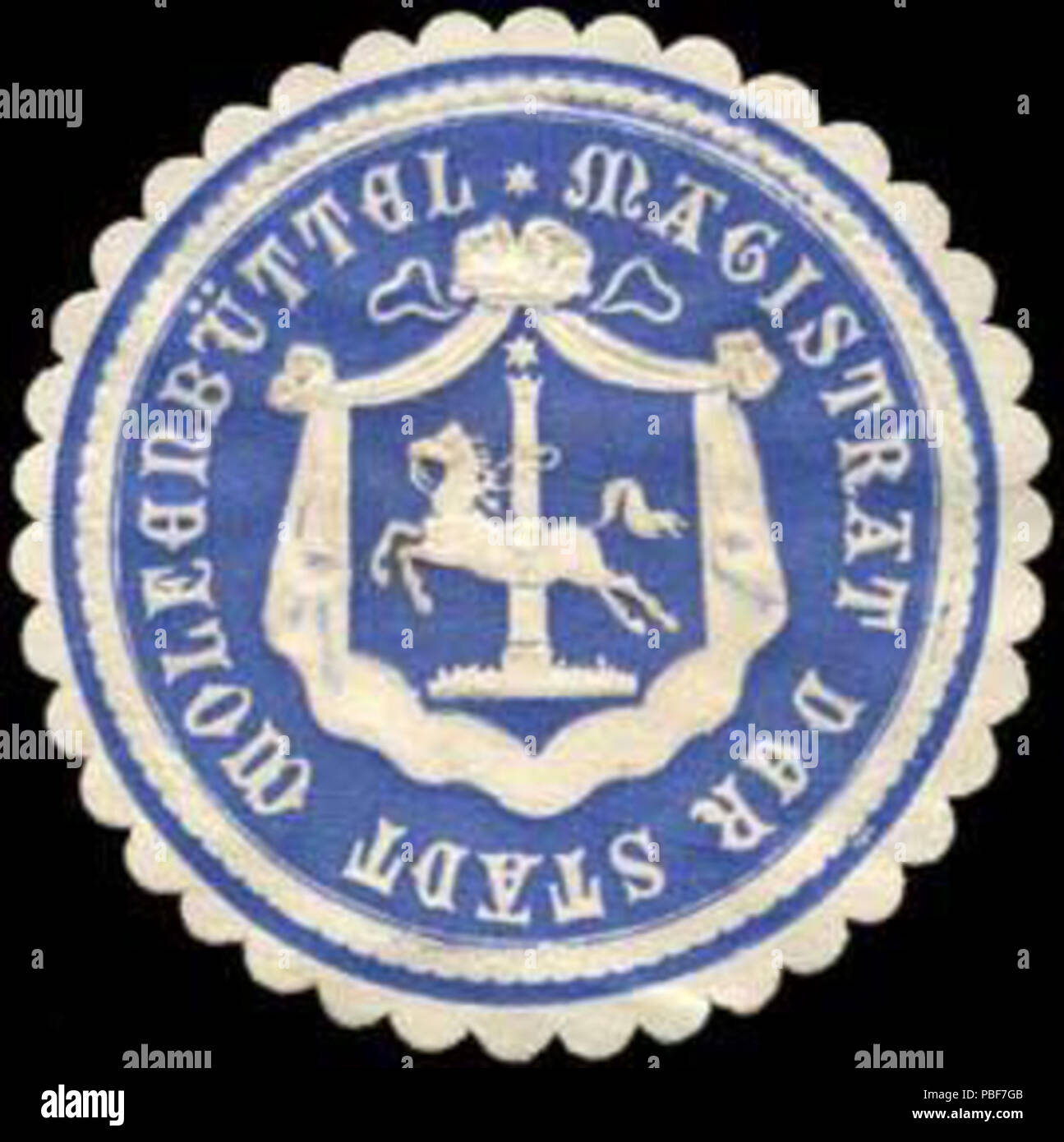 Alte Briefverschlussmarke aus Papier, welche seit ca. 1850 von Behoerden, Anwaelten, Notaren und Firmen zum verschliessen der Post verwendet wurde. 1485 Siegelmarke Magistrat der Stadt Wolfenbüttel W0290068 Foto Stock