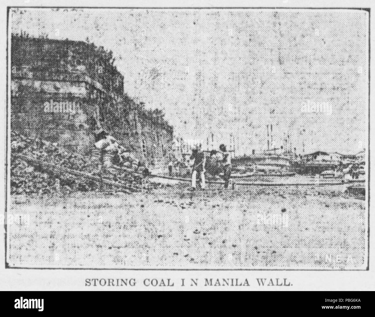 1577 La memorizzazione del carbone nella parete di Manila Foto Stock