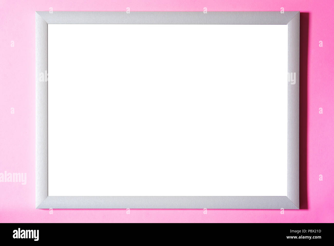 Telaio mockup su sfondo rosa. Copyspace Foto Stock