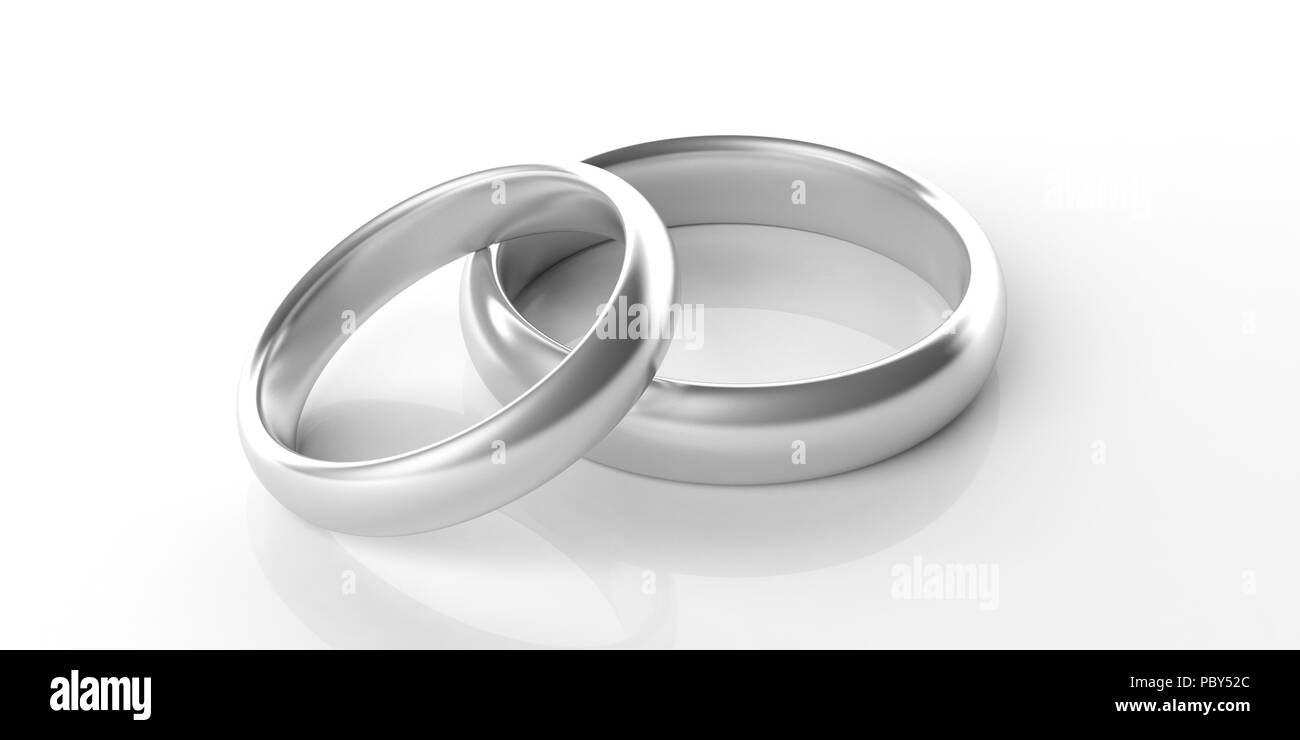 Coppia di golden platinum gli anelli di nozze isolati su sfondo bianco, primo piano, 3d illustrazione Foto Stock