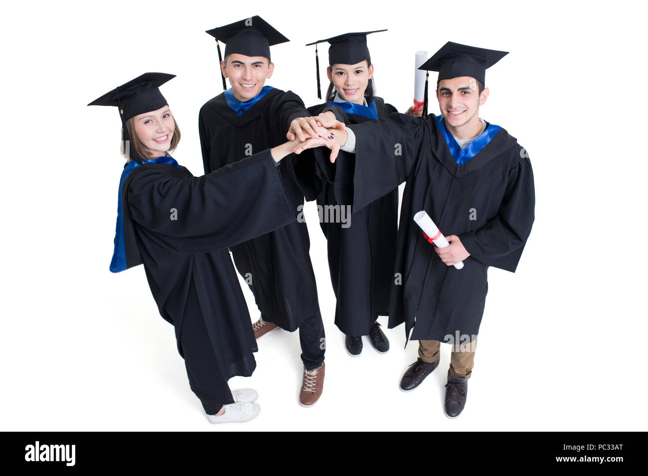 Regno laureati in abiti di graduazione Foto Stock